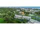 Beautiful aerial view of the landscaped community, showcasing a sparkling pool and water features at 11510 Shipwatch Dr # 1372, Largo, FL 33774