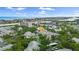 Beautiful aerial view of condo community showcasing the coastal skyline, lush landscaping, and nearby waterfront at 11510 Shipwatch Dr # 1372, Largo, FL 33774