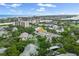 Gorgeous aerial view of condo community showcasing the coastal skyline, lush landscaping, and nearby waterfront at 11510 Shipwatch Dr # 1372, Largo, FL 33774