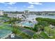 Stunning aerial view of complex featuring pool, water access and waterfront views at 11510 Shipwatch Dr # 1372, Largo, FL 33774