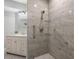 Beautiful bathroom featuring tiled walk-in shower and modern vanity at 11510 Shipwatch Dr # 1372, Largo, FL 33774