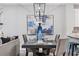 Stylish dining area with modern light fixture and decorative accents at 11510 Shipwatch Dr # 1372, Largo, FL 33774