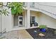 Charming front entrance with a small patio area and inviting decor at 11510 Shipwatch Dr # 1372, Largo, FL 33774