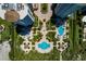 Aerial shot of luxury condos showcasing beautifully landscaped grounds, pools, and beach access at 1170 Gulf Blvd # 1006, Clearwater Beach, FL 33767