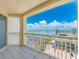 Spacious balcony offers stunning views of the water and city; a perfect spot to unwind and enjoy the scenery at 1170 Gulf Blvd # 1006, Clearwater Beach, FL 33767