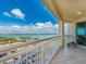 Enjoy breathtaking views of the bay from this tiled balcony, ideal for relaxing and entertaining at 1170 Gulf Blvd # 1006, Clearwater Beach, FL 33767