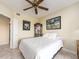 Cozy bedroom showcasing a decorative cabinet and neutral color palette at 1170 Gulf Blvd # 1006, Clearwater Beach, FL 33767