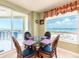 Cozy breakfast nook with great views and a table with seating for four at 1170 Gulf Blvd # 1006, Clearwater Beach, FL 33767