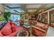 Spacious lounge area with comfortable seating, stylish decor, and large windows at 1170 Gulf Blvd # 1006, Clearwater Beach, FL 33767