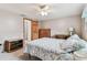 Bedroom with wood-look furnishings and a ceiling fan at 12101 Meadowbrook Ln, Hudson, FL 34667
