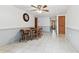 Spacious dining area featuring tile flooring, access to multiple areas of the home at 12101 Meadowbrook Ln, Hudson, FL 34667
