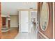 Inviting entryway showcasing tile flooring and a decorative front door, leading to living and dining areas at 12101 Meadowbrook Ln, Hudson, FL 34667