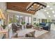 Clubhouse living room with modern furniture and decor at 12101 Meadowbrook Ln, Hudson, FL 34667