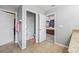 Bathroom featuring separate toilet area and entry to main bedroom at 12244 Fairlawn Dr, Riverview, FL 33579