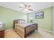 This inviting bedroom boasts a soothing color scheme and natural light at 12244 Fairlawn Dr, Riverview, FL 33579