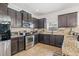 Updated kitchen featuring granite countertops and stainless steel appliances at 12244 Fairlawn Dr, Riverview, FL 33579