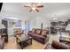 Open-concept living room with view into kitchen and dining area at 12244 Fairlawn Dr, Riverview, FL 33579