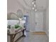 Open entryway with neutral tones, tiled flooring, and a view into the bedrooms at 12382 Shining Willow St, Riverview, FL 33579