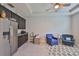 Spacious living room features stainless appliances, plenty of counterspace, and comfortable seating at 12382 Shining Willow St, Riverview, FL 33579
