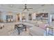 Spacious open-concept living space featuring a kitchen, dining area, and comfortable seating area at 12382 Shining Willow St, Riverview, FL 33579