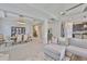 Open concept living area flows from the kitchen and living room to the dining area, perfect for entertaining at 12382 Shining Willow St, Riverview, FL 33579