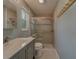 Updated bathroom with tiled shower, modern fixtures, and stylish vanity at 1368 Whispering Pines Dr, Clearwater, FL 33764