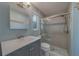 Updated bathroom with tiled shower, modern fixtures, and stylish vanity at 1368 Whispering Pines Dr, Clearwater, FL 33764
