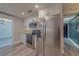 Well-lit kitchen featuring modern stainless steel appliances and white cabinets for a sleek, efficient space at 1368 Whispering Pines Dr, Clearwater, FL 33764