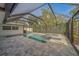 Enjoy the outdoors with a screened-in pool, spa, and brick pavers that provide the perfect ambiance for entertaining at 1368 Whispering Pines Dr, Clearwater, FL 33764