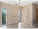 Light-filled entryway with closet and decorative windows at 13898 Jamaica Dr, Seminole, FL 33776
