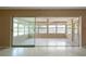 Enclosed lanai featuring a ceiling fan, and lots of natural light at 13898 Jamaica Dr, Seminole, FL 33776