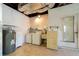 Functional laundry area with washer, dryer, utility sink, and storage at 13898 Jamaica Dr, Seminole, FL 33776