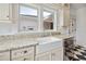Close-up of the kitchen sink and countertop featuring granite countertops at 13917 8Th St, Dade City, FL 33525