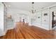 Bright and spacious living room with hardwood floors, and built-in bookshelves at 13917 8Th St, Dade City, FL 33525