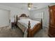 Bedroom featuring carpet floors, a bed, side table and two windows at 140 Morrow Cir, Brandon, FL 33510