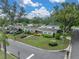 Lovely residential home with landscaped front yard, mature trees, and a well-maintained lawn on a sunny corner lot at 140 Morrow Cir, Brandon, FL 33510