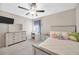 This bedroom features a vanity and comfortable decor at 14716 Crescent Rock Dr, Wimauma, FL 33598