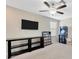 Bonus room with ceiling fan and entertainment area at 14716 Crescent Rock Dr, Wimauma, FL 33598