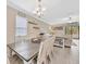 Bright open-concept dining area with direct access to the backyard through sliding glass doors at 14716 Crescent Rock Dr, Wimauma, FL 33598