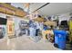 Garage featuring overhead storage and an organized layout at 14716 Crescent Rock Dr, Wimauma, FL 33598