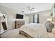 Bright main bedroom with neutral tones, stylish decor, and a relaxing retreat at 14716 Crescent Rock Dr, Wimauma, FL 33598