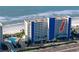 Exterior aerial view of the condo with the pool in view, next to the ocean at 15000 Gulf Blvd # 407, Madeira Beach, FL 33708