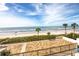Spacious balcony offering panoramic ocean views, ideal for relaxation and outdoor dining at 15000 Gulf Blvd # 407, Madeira Beach, FL 33708