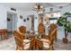 Light-filled dining area with seating for six next to the breakfast nook at 15000 Gulf Blvd # 407, Madeira Beach, FL 33708