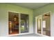Enjoy indoor-outdoor living; covered patio and sliding glass doors create bright spaces at 15709 Leatherleaf Ln, Land O Lakes, FL 34638
