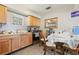 View of a kitchen with tile floors, wood cabinets and stainless appliances at 1607 Bell Shoals Rd, Brandon, FL 33511