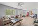 Spacious living room featuring wood floors and multiple windows for natural light at 1607 Bell Shoals Rd, Brandon, FL 33511