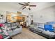 View of a living room with tile floors and gray sofas at 1607 Bell Shoals Rd, Brandon, FL 33511