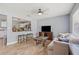 Inviting living room featuring an open layout with modern flooring and a view into the kitchen at 1607 Bell Shoals Rd, Brandon, FL 33511