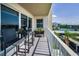 Enjoy water views from this condo balcony with seating at 1621 Gulf Blvd # 407, Clearwater Beach, FL 33767